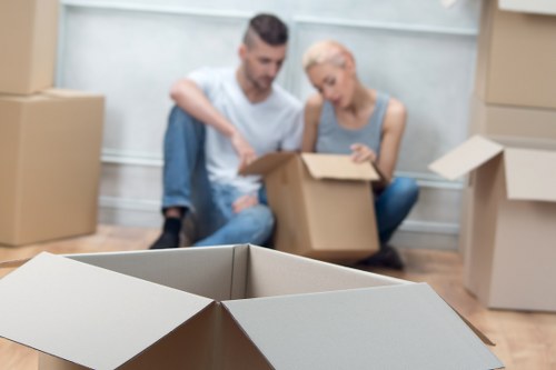Packed home removal boxes and protective wrapping for a move in Hornsey