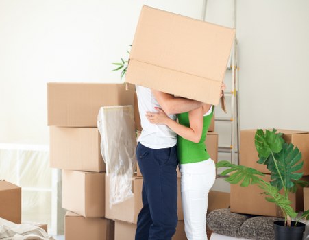 Moving team handling furniture and boxes near Hornsey homes