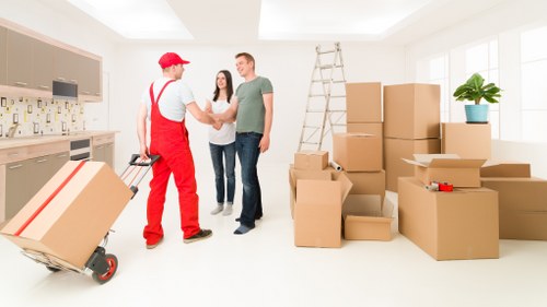 Boxes and furniture being loaded by movers for a Hornsey house move