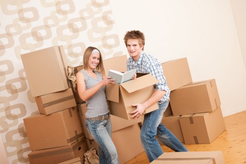 Office desks and chairs arranged for furniture removal in Hornsey